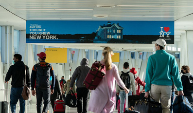 Passengers walk at John F Kennedy International Airport